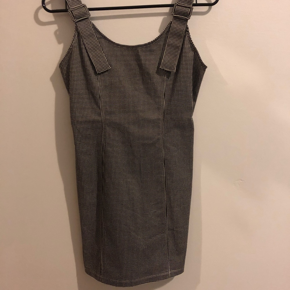 A body-con overall dress